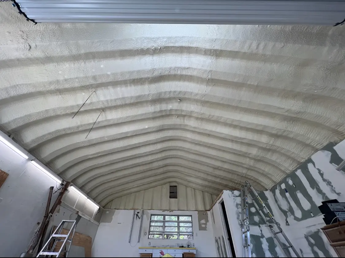 Spray polyurethane foam applied to the underside of a metal roof deck in Bridgewater